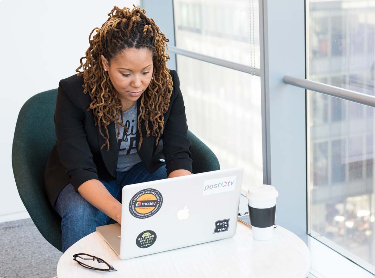 A woman working on a laptop